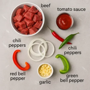 Essential Jamaican peppered steak prep ingredients on white plate
