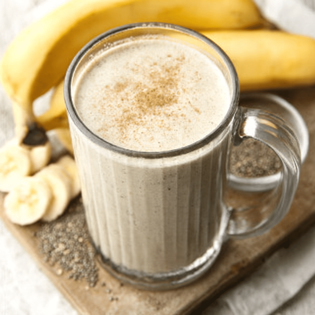 banana smoothie in glass mug with cinnamon and chia